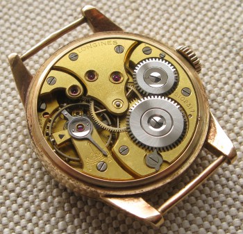 LONGINES. золото 583 проба, 30.5мм, 28,2 грамма. 1935гг. Швейцария. , Корпус Артель Ленточмех Ленинград, Артикул 1678