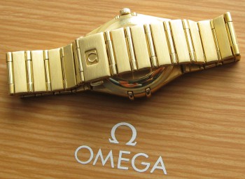 OMEGA CONSTELLATION, золото 750 проба, 79.4грамма общий вес, 28мм диаметр, женские., Артикул 1681